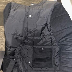 Black north face jacket , size M . Like New , only worn once